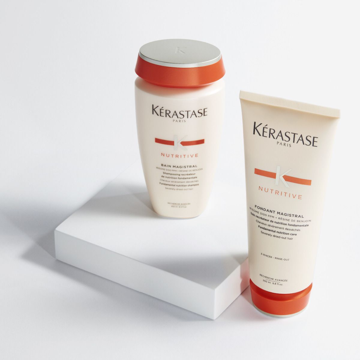 Een productfoto van een shampoo en conditioner van kérastase nutritive